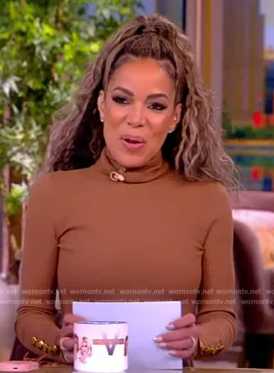Sunny’s beige turtleneck sweater and floral skirt on The View
