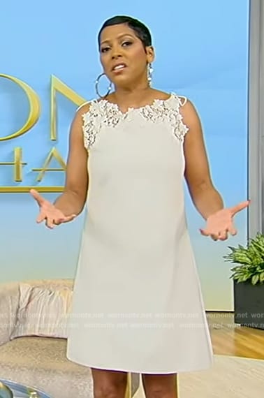 Tamron’s white lace trim mini dress on Tamron Hall Show