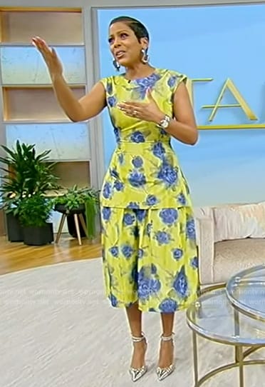 Tamron’s yellow floral print top and skirt on Tamron Hall Show