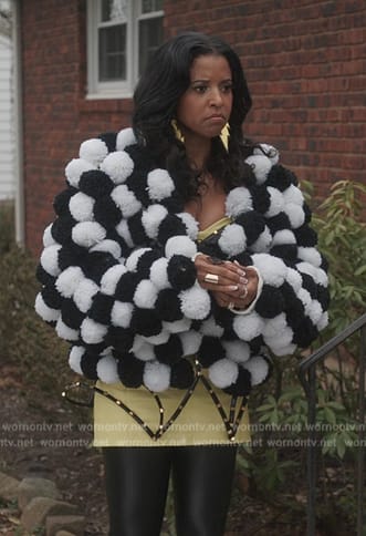 Wickie’s black and white pom-pom jacket on Girls5eva
