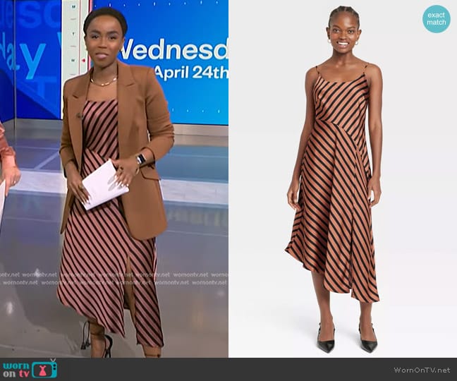A New Day Asymmetrical Midi Slip Dress in Brown Striped worn by Zinhle Essamuah on NBC News Daily