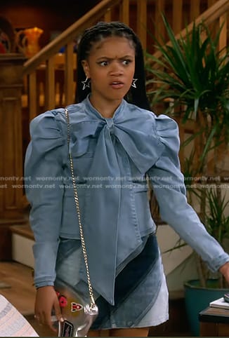 Aaliyah’s tie neck denim blouse and mini skirt on The Upshaws