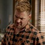 Adam’s orange checked shirt on Chicago PD