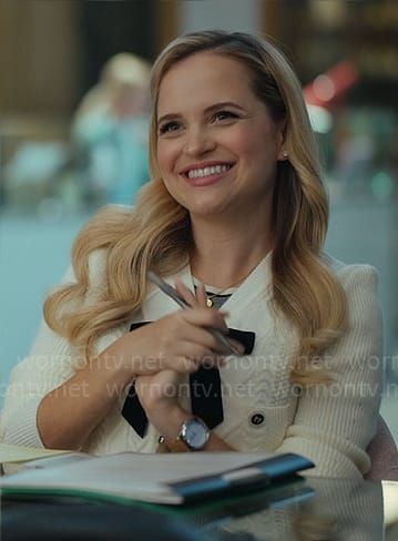 Ainsley’s cable knit cardigan with bow on Loot