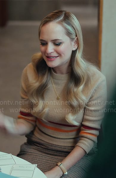 Ainsley’s camel striped sweater and houndstooth skirt on Loot