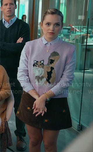 Ainsley’s cat sweater vest and brown floral skirt on Loot