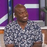 Akbar’s navy and white printed short sleeve shirt on The Talk
