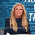 Alison Triessl’s navy folded neck dress on Access Hollywood