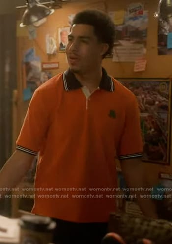Aaron’s orange polo on Grown-ish