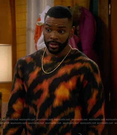 Bernard’s tiger stripe cashmere sweater on The Upshaws