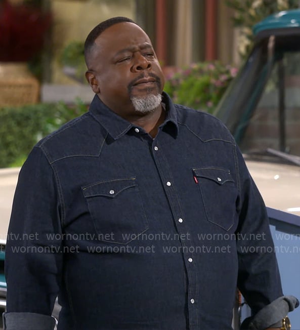 Calvin’s dark denim shirt on The Neighborhood