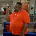 Calvin’s orange striped collar polo shirt on The Neighborhood