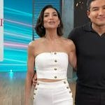 Courtney’s white button vest and pants on Access Hollywood