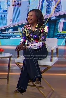Deborah’s black floral blouse and pants with white stitching on Good Morning America