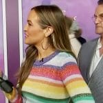Emily Orozco’s metallic stripe sweater on Access Hollywood