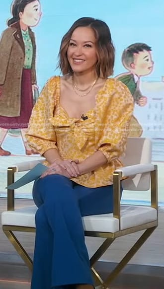 Eva’s yellow floral peplum top and blue flare pants on Good Morning America