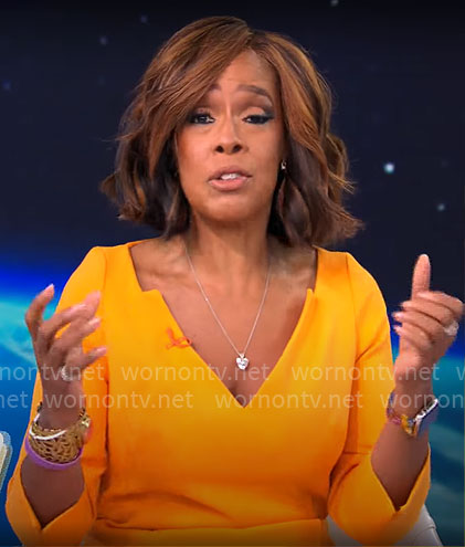 Gayle King’s orange v-neck dress on CBS Mornings