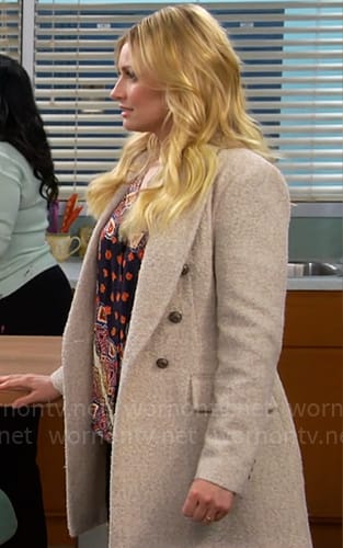 Gemma’s beige tweed coat on The Neighborhood