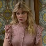 Gemma’s pink ruffle sleeve top on The Neighborhood