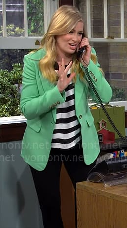 Gemma’s striped top and green blazer on The Neighborhood