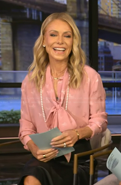 Kelly’s pink tie neck blouse on Live with Kelly and Mark
