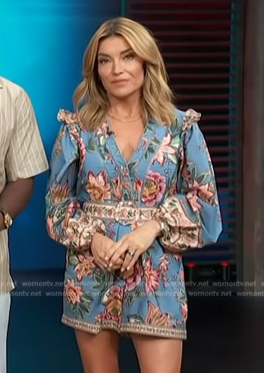 Kit’s blue floral print romper on Access Hollywood