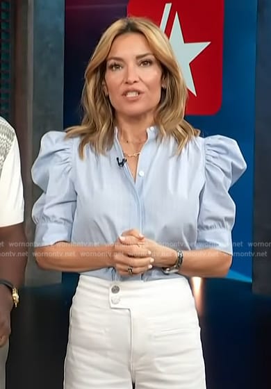 Kit’s blue puff sleeve top on Access Hollywood