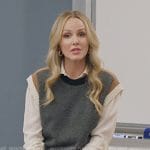 Laura’s gray vest on All American