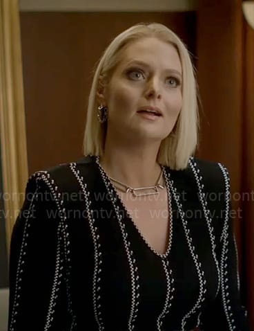 Lexi’s black and white striped v-neck dress on Not Dead Yet