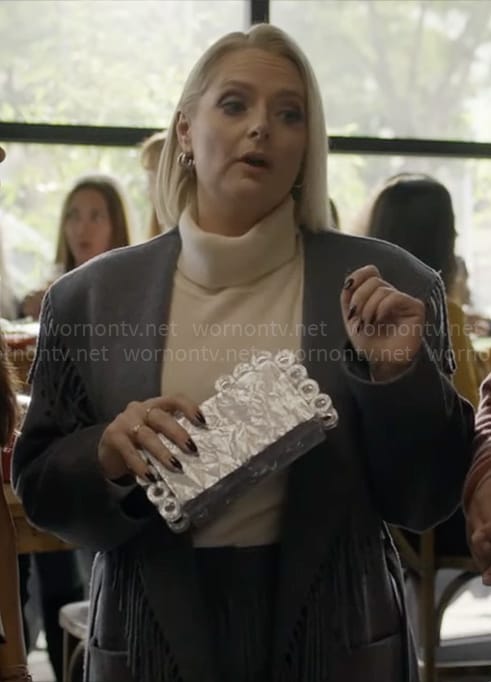Lexi’s grey fringed coat on Not Dead Yet