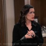 Lois’s black leather detail shirt and studded bag on General Hospital