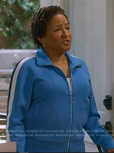Lucretia’s blue side stripe track jacket and pants on The Upshaws