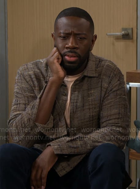 Malcolm’s brown textured overshirt on The Neighborhood