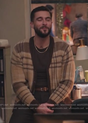 Manny’s plaid fuzzy cardigan on Abbott Elementary