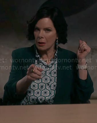 Margaret’s flower hexagon blouse on So Help Me Todd
