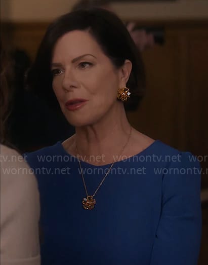 Margaret’s flower earrings and pendant necklace on So Help Me Todd