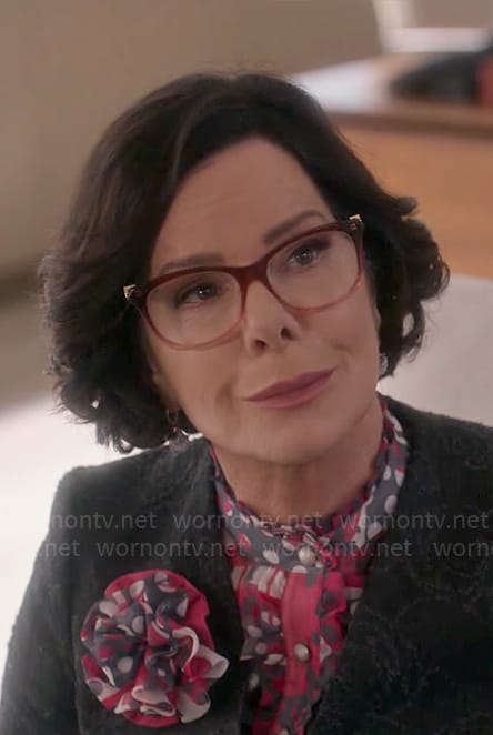 Margaret’s pink and purple ombre glasses on So Help Me Todd