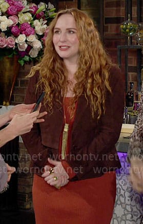 Mariah’s orange rib knit dress and brown suede jacket on The Young and the Restless
