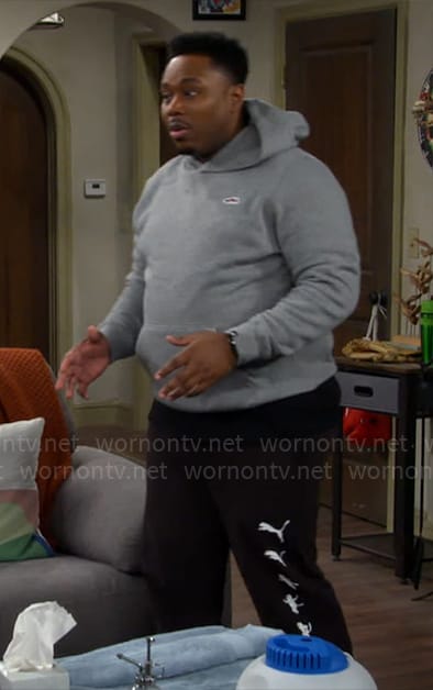 Marty’s grey shoe hoodie and black sweatpants on The Neighborhood