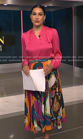 Morgan’s pink blouse and print pleated skirt on NBC News Daily