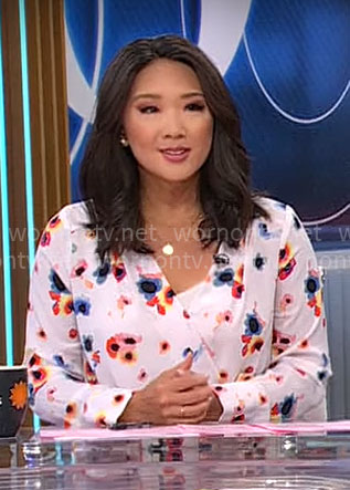 Nancy Chen’s white floral wrap blouse on CBS Saturday Morning