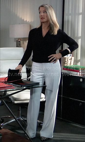 Nina’s black wrap top and white pants on General Hospital
