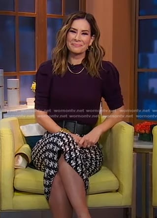 Rebecca’s purple puff sleeve sweater and printed skirt on Good Morning America