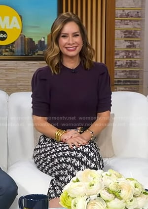 Rebecca’s purple puff sleeve sweater and printed skirt on Good Morning America