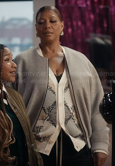 Robyn’s grey bomber jacket and printed cardigan on The Equalizer