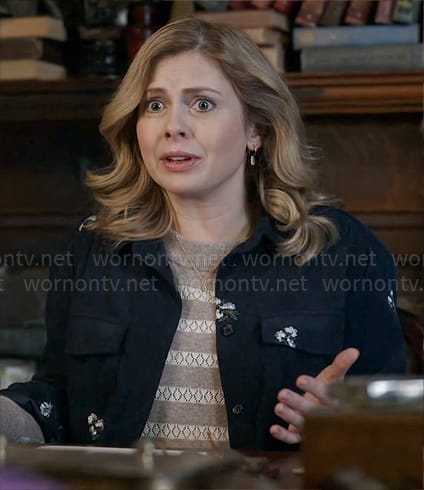 Sam’s taupe striped sweater and floral embroidered jacket on Ghosts