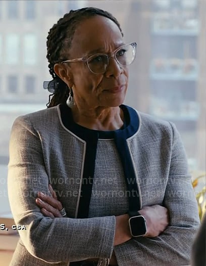 Sharon’s grey dress and jacket set with navy trims on Chicago Med