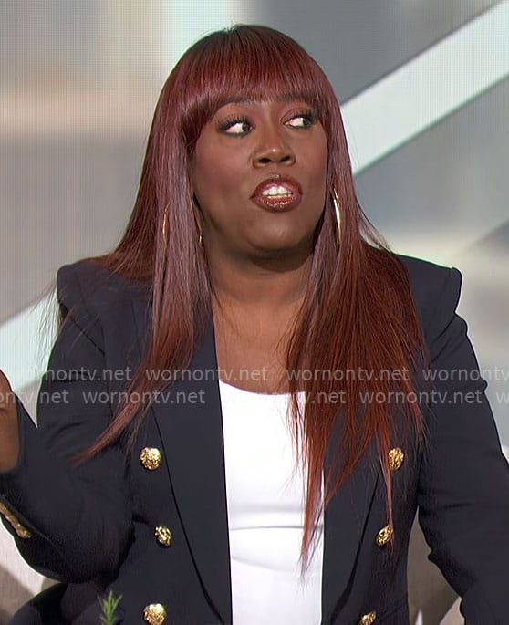 Sheryl’s navy blazer with gold buttons on The Talk