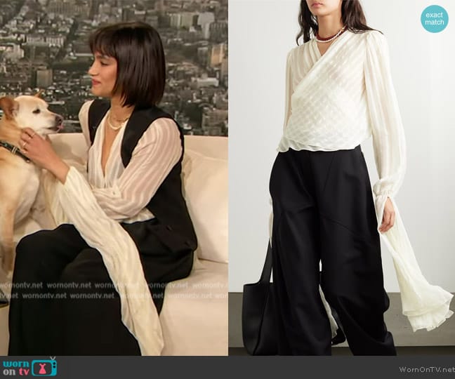 Stella McCartney Striped organic silk-blend chiffon wrap blouse worn by Sofia Boutella on The Drew Barrymore Show