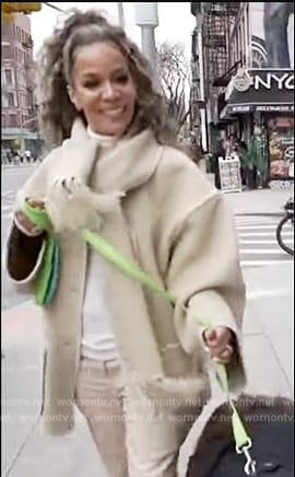 Sunny’s beige scarf coat on The View